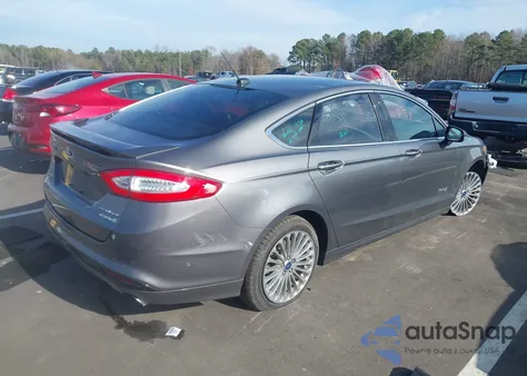 2014 Ford Fusion Hybrid Titanium из США, поврежденный, VIN 3FA6P0RUXER107209